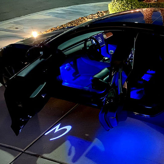 Dørlys med logo 2 stk for Model 3 (2018-08.2023)